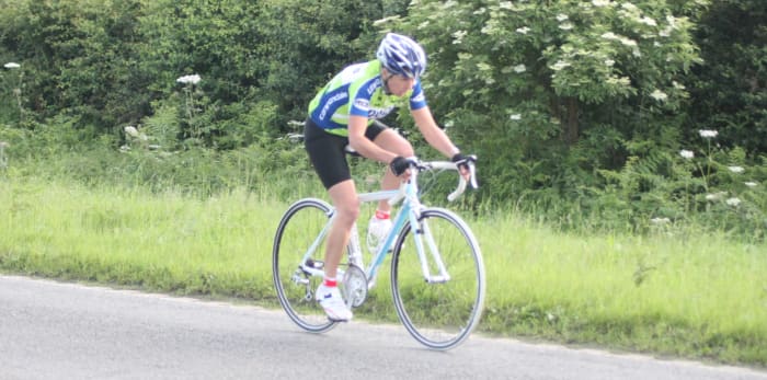 The muscles for cycling in action. A female cyclist on an Orbea road bike. The Soleus muscle of this rider is initiating the recovery phase of the pedal stroke.