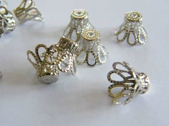 Small Bead Caps. Beautiful with lucite flower beads and the perfect spacers between crystals and flowers.