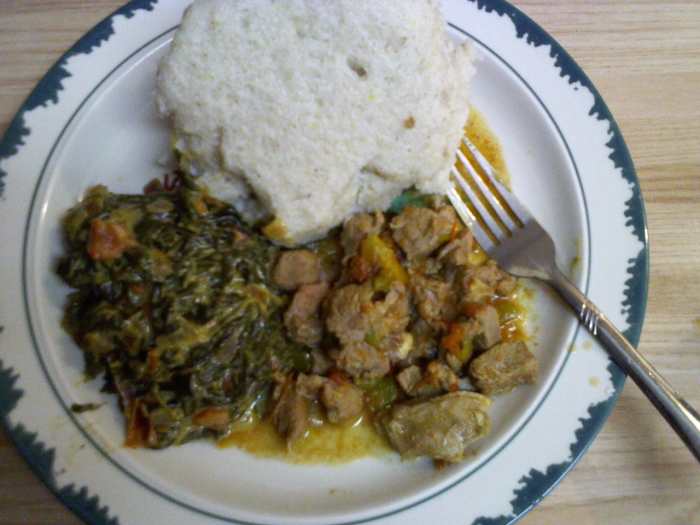 Ugali (white made from corn/maize meal), Isageek (green) & Goat Meat