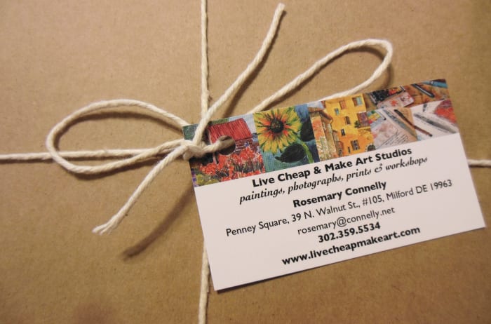 Even brown wrapping paper and string have an artistic flare once Rosemary finishes wrapping my purchase.