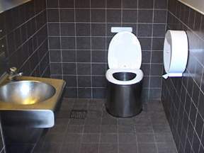 Composting toilet in a public restroom in Sweden. Note that any drugs a person has taken are burned off in this kind of system.