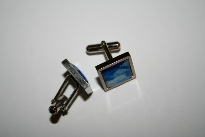 During the Art Deco period, men often wore cufflinks with large geometric stones.