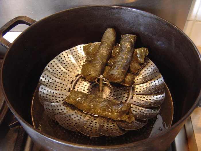 Alternatively, you can put them into a pan and stack them on a steamer. This way you can cook more vine leaves at one time - save energy and feed more people!