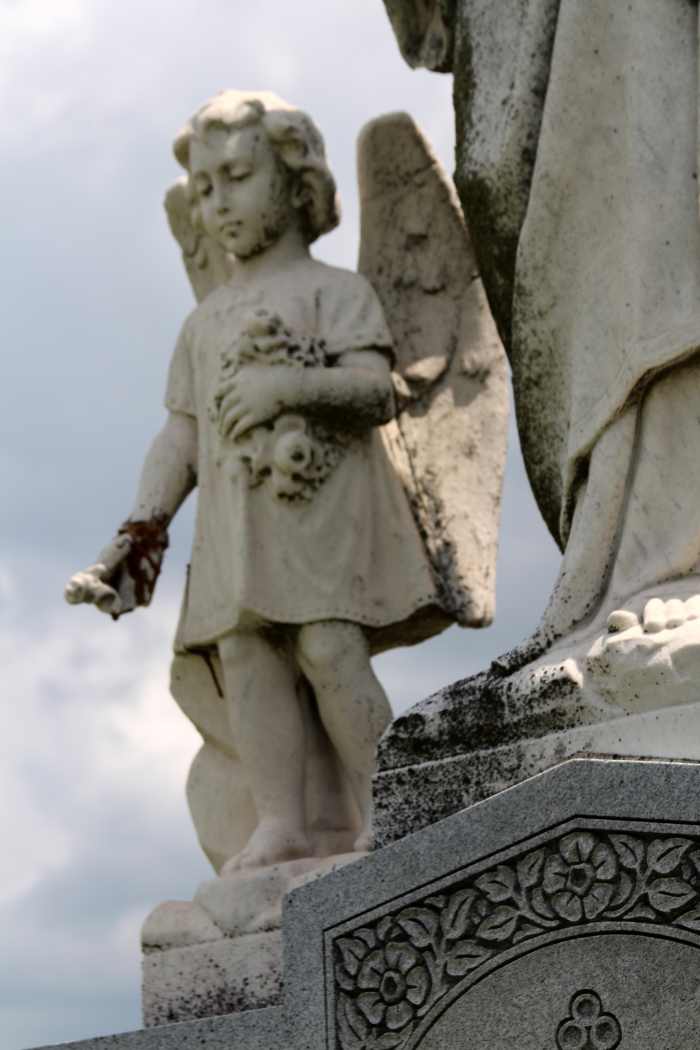 Whenever I'm driving around Milwaukee, I'm always on the lookout for potential locations. This cemetery where I took this shot is a perfect example of where this looking can lead.