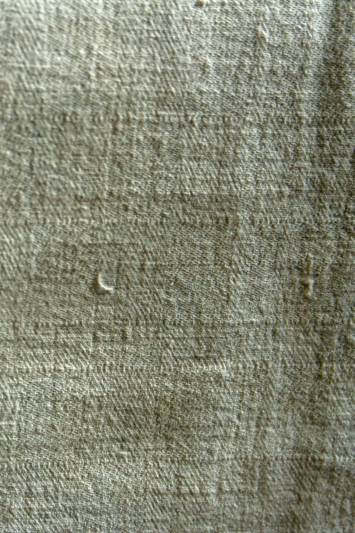 An approximately 100 year old piece of hand woven linen cloth