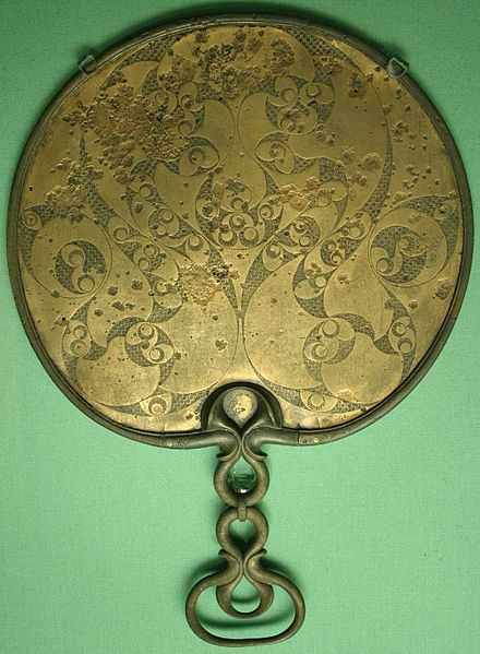 Beautiful bronze decorated backside of a mirror. An example of Celtic art in the Romano-Britain period. (England)