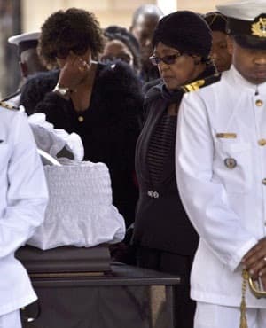 Winnie next to Mandela's Coffin lying in State in Pretoria. Madikizela-Mandela bids farewell to the former president lying in state at the Union Buildings in Pretoria