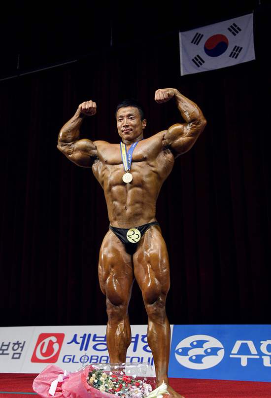Kang Kyung Won (강경원) at the National Spring Sports Festival in 2010, his 12th consecutive first place win in the annual bodybuilding competition