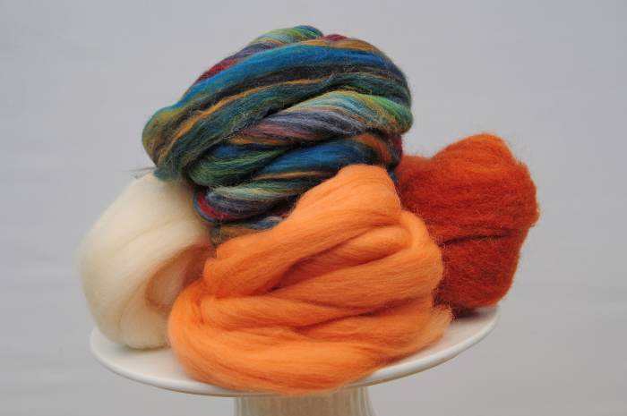 Wool Roving, the green blend is a perfect example of what can be used for a realistic stem.
