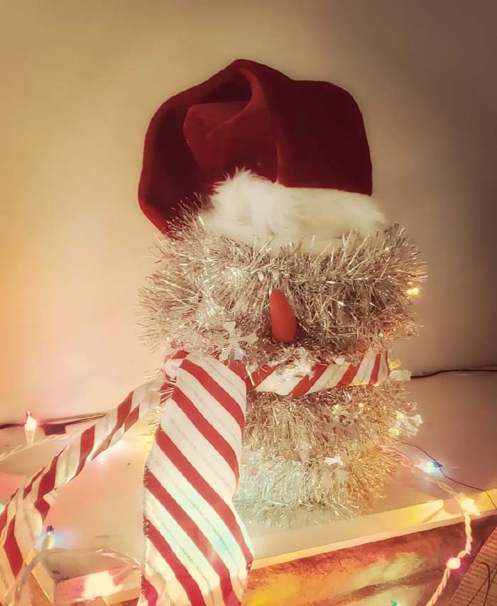 This miniature snowman decoration is easy to create using items you may already have around the house.
