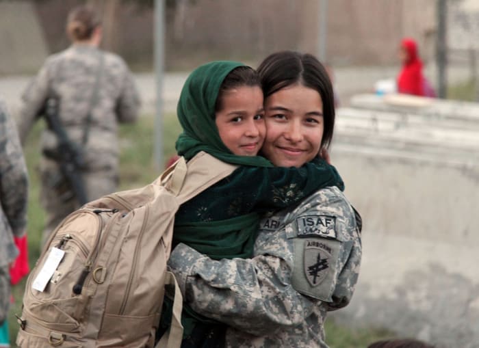 The International Security Assistance Force drops off school supplies for children in Afghanistan.