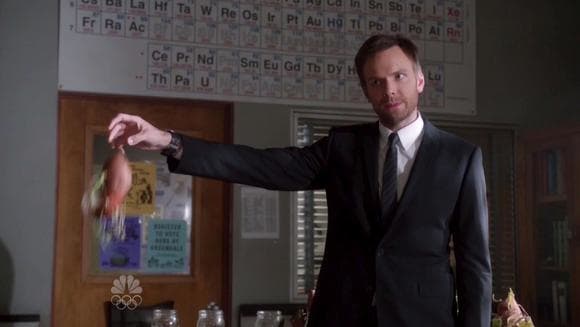 Joel McHale holding up the sweet potatoe plant as evidence in NBC's Community paradoy episode of Law and Order! Growing plants from sweet potatoes!