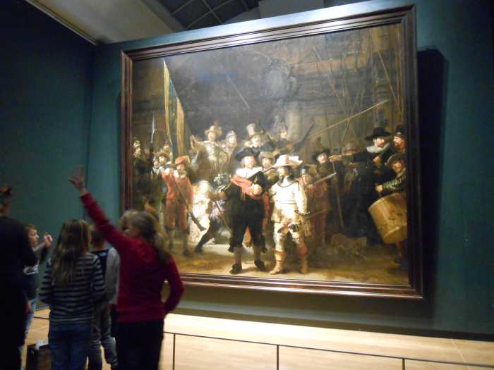 Rembrandt's famous painting of, "The Night Watch." I included people in the picture so you can see how large the painting is.