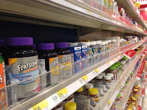 A store shelf showing different types of vitamins. Even if a woman eats a well balanced diet, it is still suggested that she takes high quality prenatal vitamins during her pregnancy.