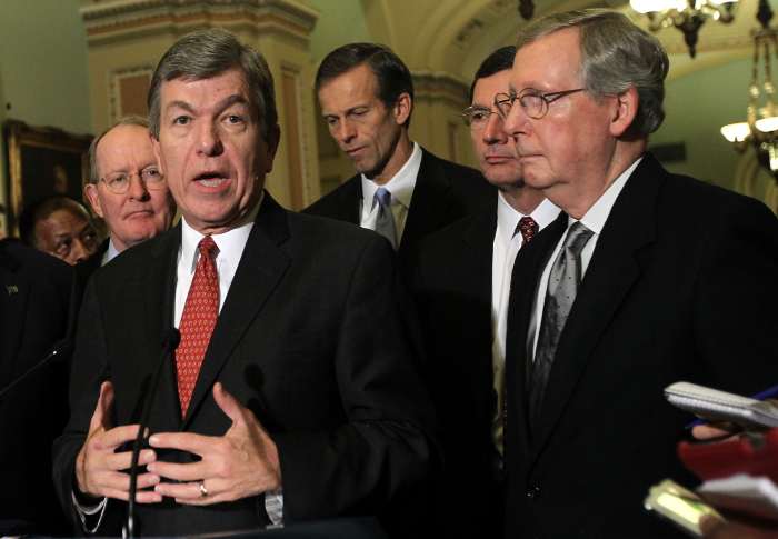 Senators Roy Blunt (R-MO), Lamar Alexander (R-TN), John Thune (R-SD), John Barrasso (R-WY) Mitch McConnell (R-KY) at a news briefing after the weekly Republican policy luncheon on December 13, 2011 at the US Capitol