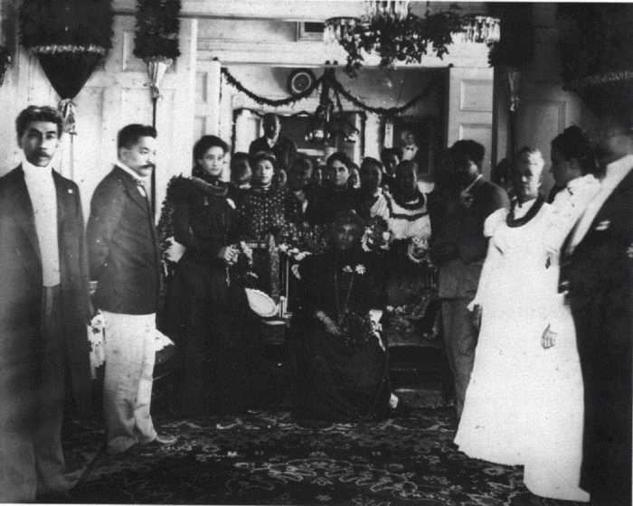 Queen Liliuokalani and her court at Washington Place, now the Governor's mansion, on the day of annexation