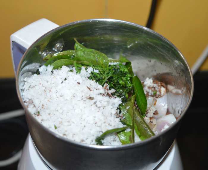 Add grated coconut, tamarind pulp, and salt to the mixer. Grind to get a smooth paste. If needed, add water while grinding.