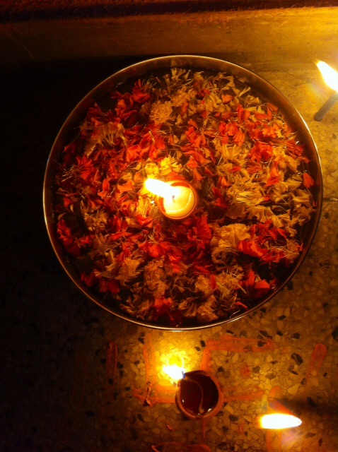 Flower Rangoli with Diya in the centre is considered auspicious on Diwali if placed at the entrance of Homes