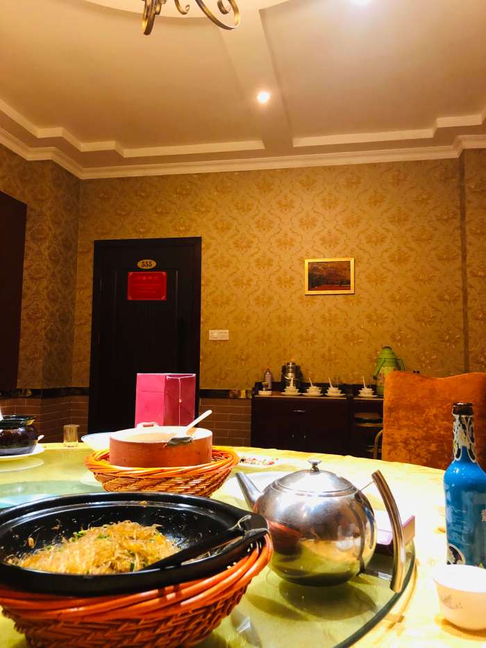 Eating in a "hotel restaurant" in Hunan, China. These restaurants feature several private rooms and each table is located in a single room. These places are great for having private dinners with friends, family and large groups of people.