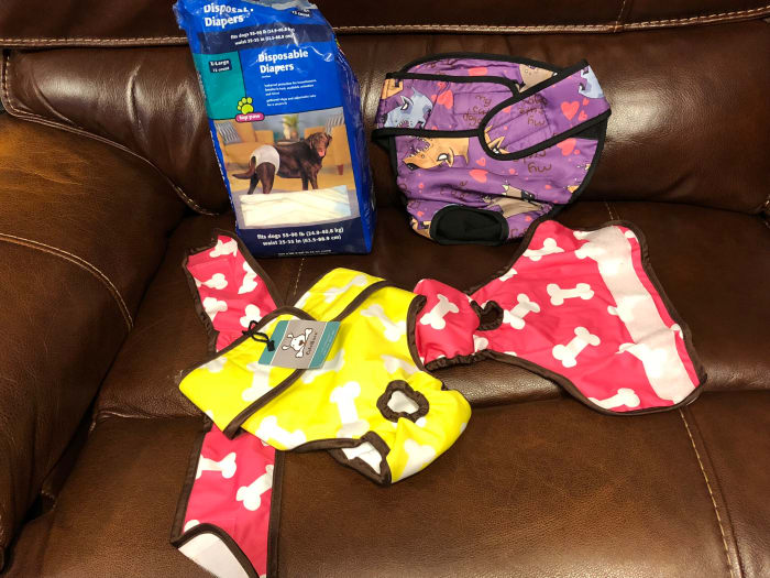 Disposable diapers and cloth. You place disposable rectanglar incontinence pads inside the cloth diapers.