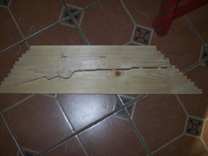 After cutting the rifle out, you will see that it will give a nice 3d feel once it is painted.