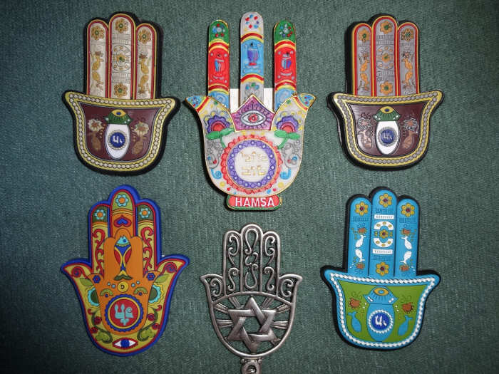 The Hamsa Hand is a symbol commonly used in apotropaic magick. Attribution requires this license information to be shared: CC by SA 3.0; https://creativecommons.org/licenses/by-sa/3.0/deed.en