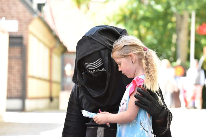 I can only imagine how happy this little girl was to get an autograph from a Star Wars character, even if he was a villain.