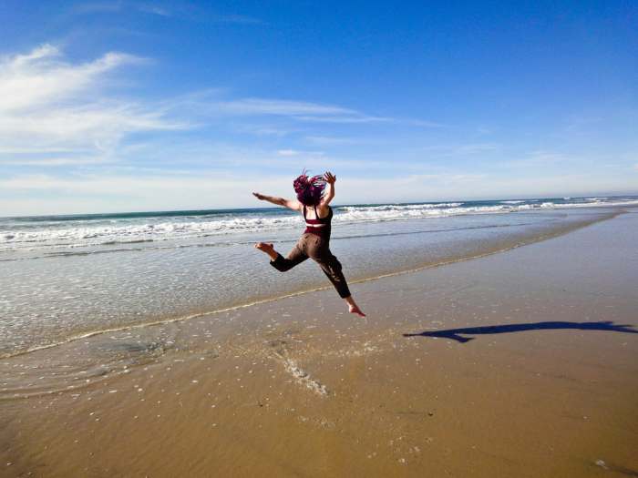 Smiling and jumping around like you're happy (when you feel like curling up in a ball and crying) is actually a very helpful temporary coping technique.