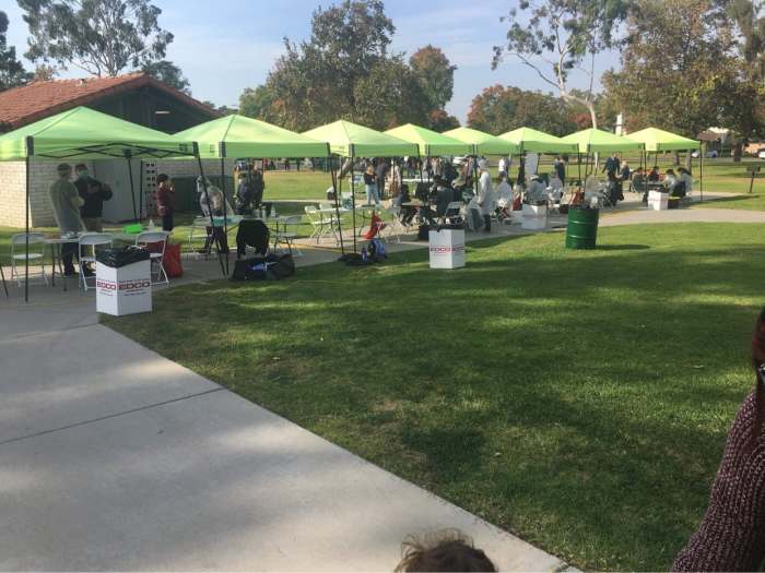 See that green bucket on the left side of the picture? That was the communal sanitization area for the volunteers and employees.