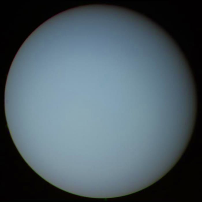 Uranus' eccentric rotation: spinning backward and on its side