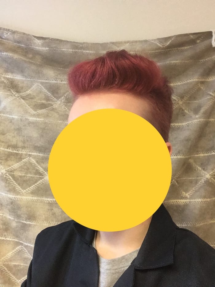 Here's a photograph of me about a week after I used the dye. It's pretty red in the picture, but looks even redder in the right lighting. Face obscured for security.