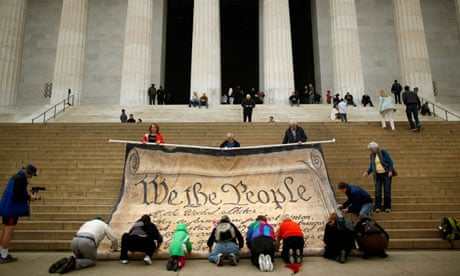 Protesters against the supreme court decision on corporate political spending roll up a giant version of the US constitution, the 'most powerful statement of democratic principle … ever written'.