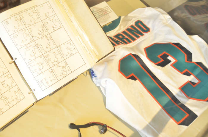 Dan Marino memorabilia is shown at the Pro Football Hall of Fame. Marino is the greatest quarterback in NFL history never to win a Super Bowl.
