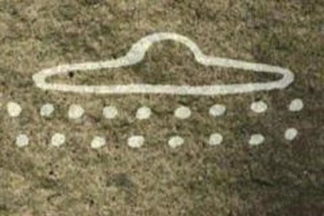 A Paleolithic Cave Painting, Dating to 13,000 B.C in France appears to depict a UFO.