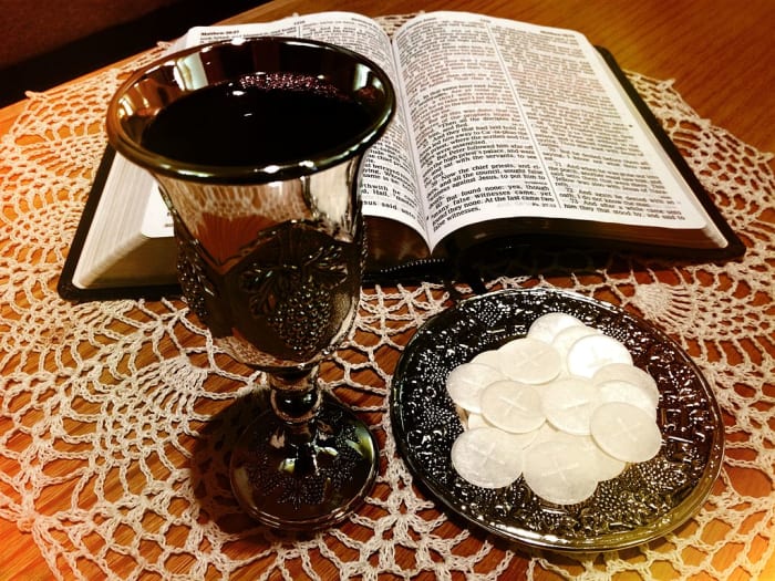 Communion wafers (Bread) symbolizing Jesus; "Communion Table"