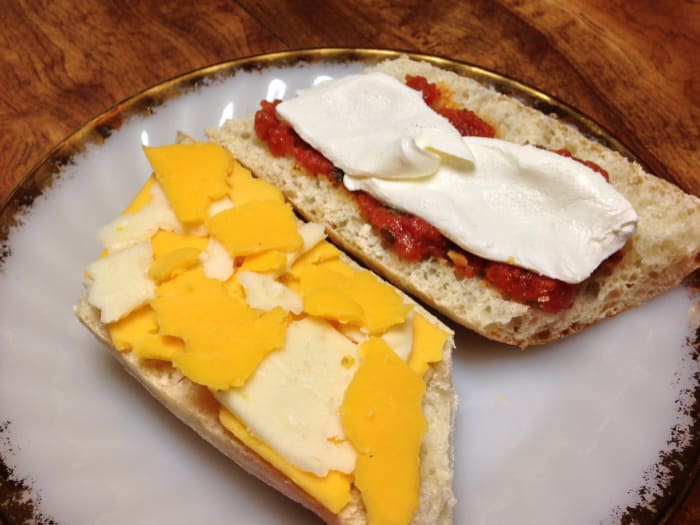 Baguette with Jalapeno Jack and sharp cheddar cheese on the left, and Abruzzi tomatoes and cream cheese on the right