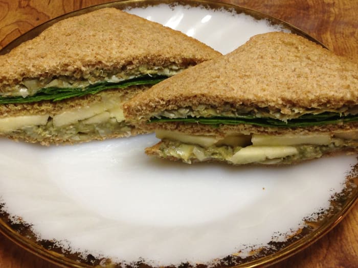 Green Club Sandwich from Weight Watchers Make & Take Meals cookbook. You'll need avocado, artichokes, hummus, Granny Smith apple, and spinach.