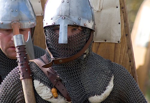 Only a knight with land and tenants could afford armour of this quality - Norman chain mail, helmet and weaponry on show