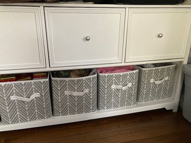 These fabric bins look so much neater than the piles of stuff that used to be on the shelf of my credenza.