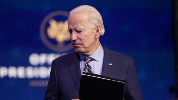 President-elect Joe Biden leaves after speaking at The Queen theater in Wilmington, Delaware on December 28, 2020.