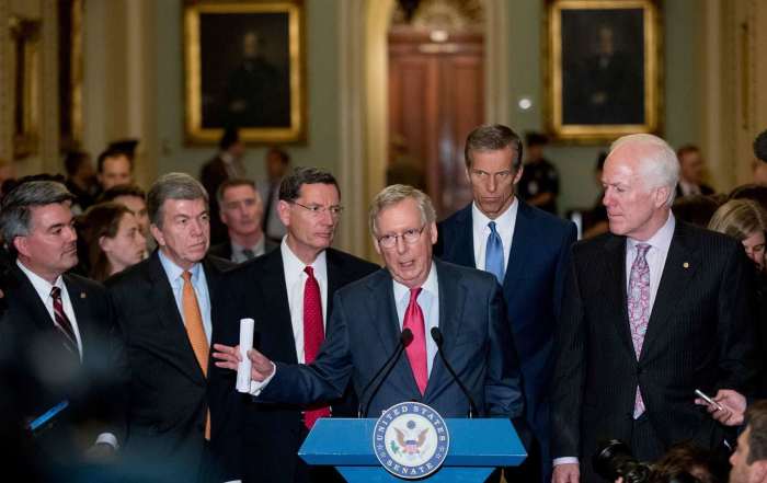 Senate Majority Leader Mitch McConnell, accompanied by Republican members of the Senate, speaking at a news conference in Capitol Hill in Washington DC, on November 16, 2016.
