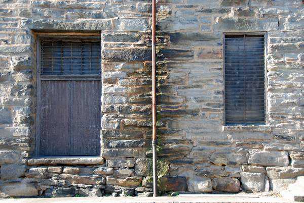 Windows, and Drains - Nature and Time has a way of coloring old stone that makes every wall a piece of art.