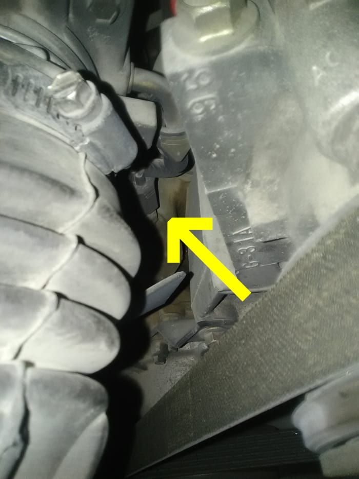 Depending on your particular model, the CMP sensor may be hiding behind other components towards the front or rear of the engine.