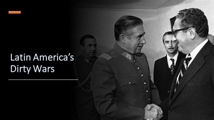Chilean dictator Augusto Pinochet shakes hands with Henry Kissinger in 1976.