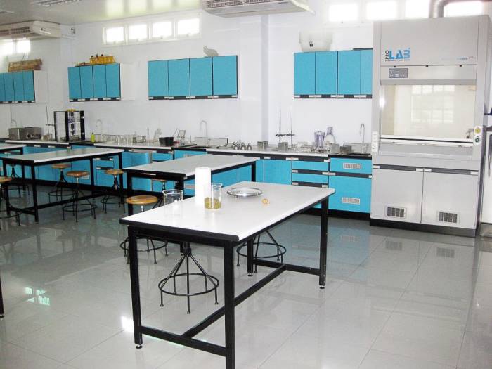 Some high school lab stations have an electrical outlet, a gas hookup, and a water source at the places where students sit. Others have them at different areas in the lab.
