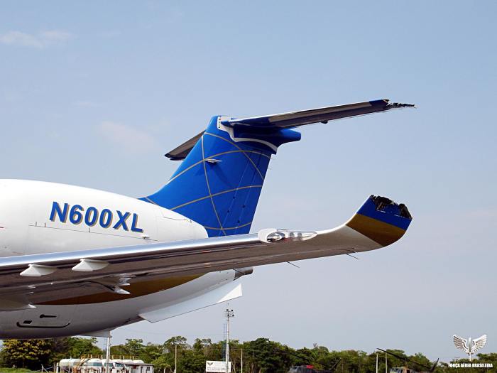 Damaged left wing and horizontal stabilizer of the Embraer Legacy jet