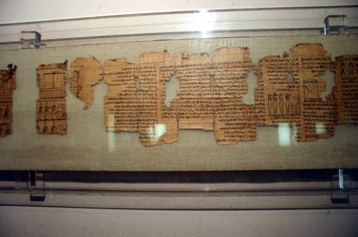 Egyptian Museum in the Castello sforzesco in Milan, Italy. A papyrus displaying a copy of the Book of the Dead, in hieratic writing, dating from the Ptolemaic (i.e. late) period.