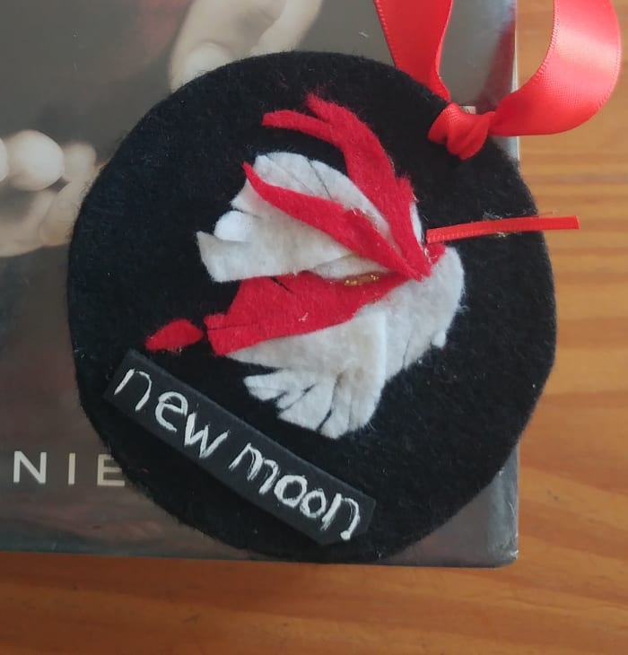 Glue Circles together. You may simply do this craft with only one felt circle, but two make a thicker bookmark.