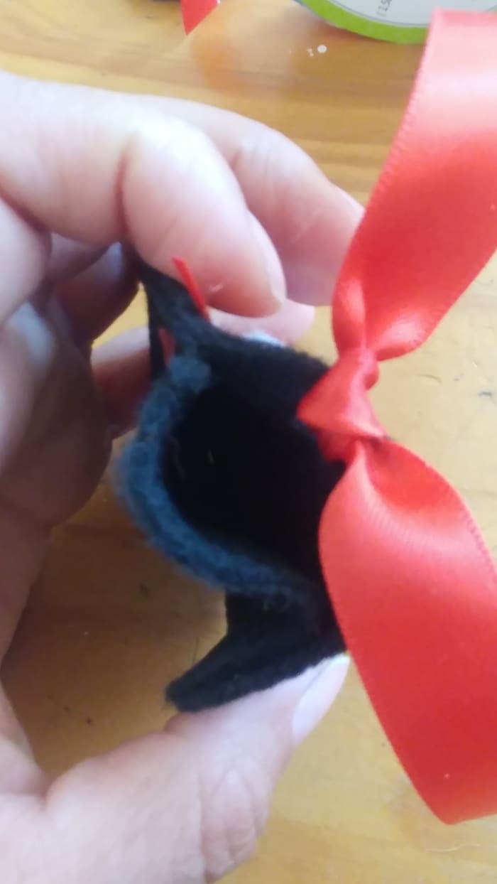 If you would like the bookmark to be hollow? Just glue around the edges, to glue circles together. This step is optional, but it is fun to place a little paper inside the bookmark!