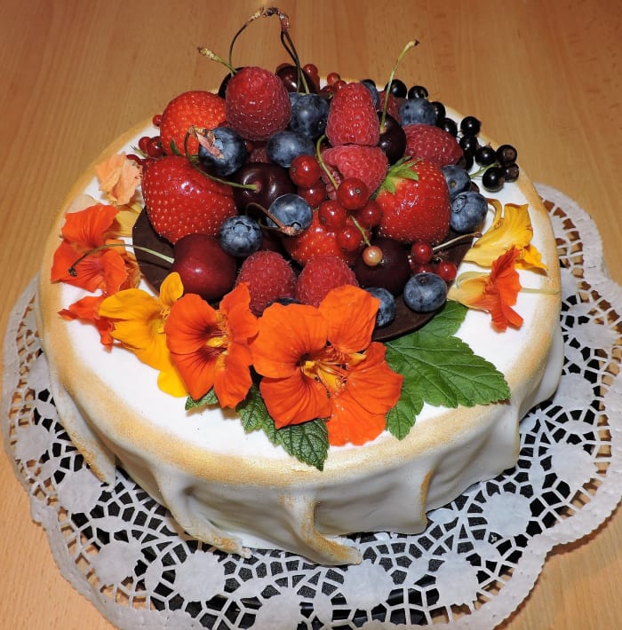 The flowers are edible and so make an excellent decoration. Place them on just before serving for the best effect.